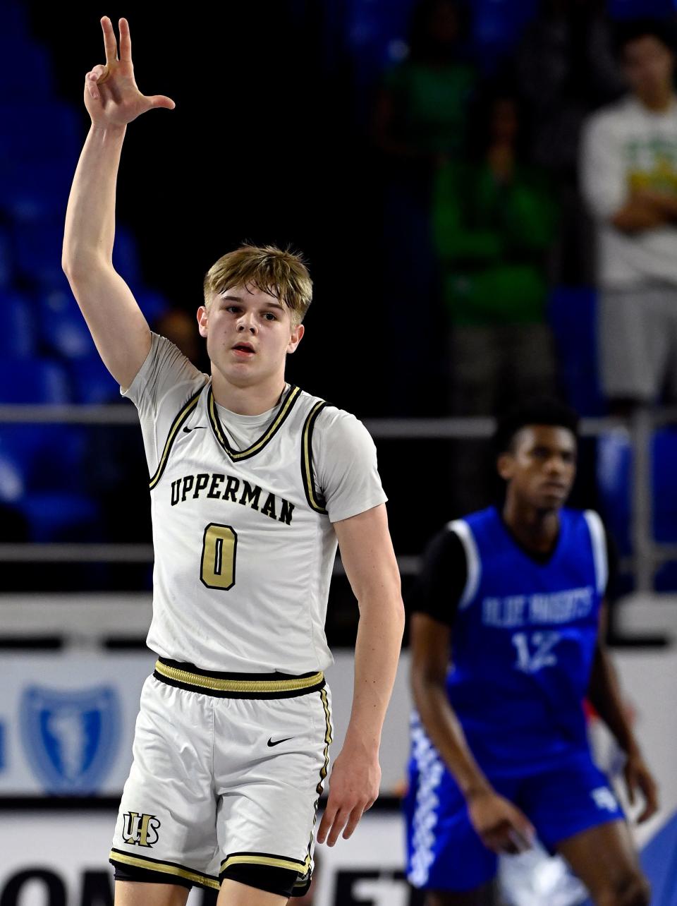 Upperman's Tyce Cobb (0) reacts after making 3-point basket against Hume-Fogg during the first half of an TSSAA 3A boys basketball state quarterfinal game Thursday, March 14, 2024, in Murfreesboro, Tenn.