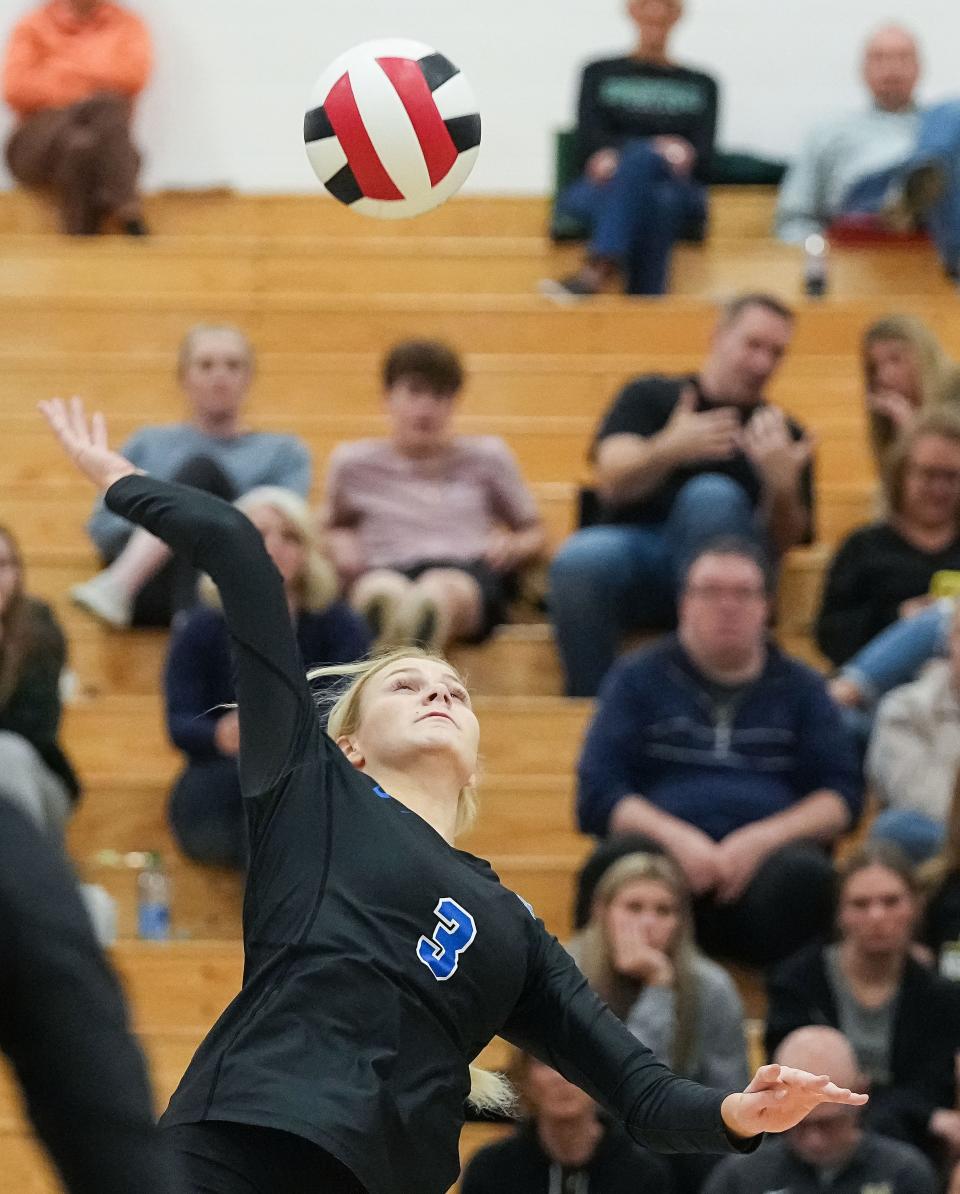 Hamilton Southeastern outside hitter Lindsey Mangelson (3) hits the ball , Oct. 13, 2022, at HSE.