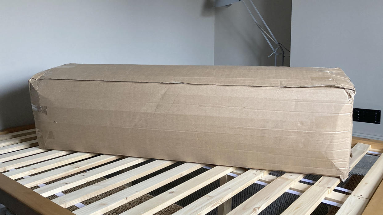  Mattress in a box on a bed frame. 