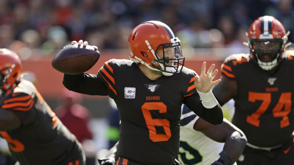 Cleveland Browns quarterback Baker Mayfield throws during the first half of an NFL football game against the Seattle Seahawks, Sunday, Oct. 13, 2019, in Cleveland. (AP Photo/Ron Schwane)