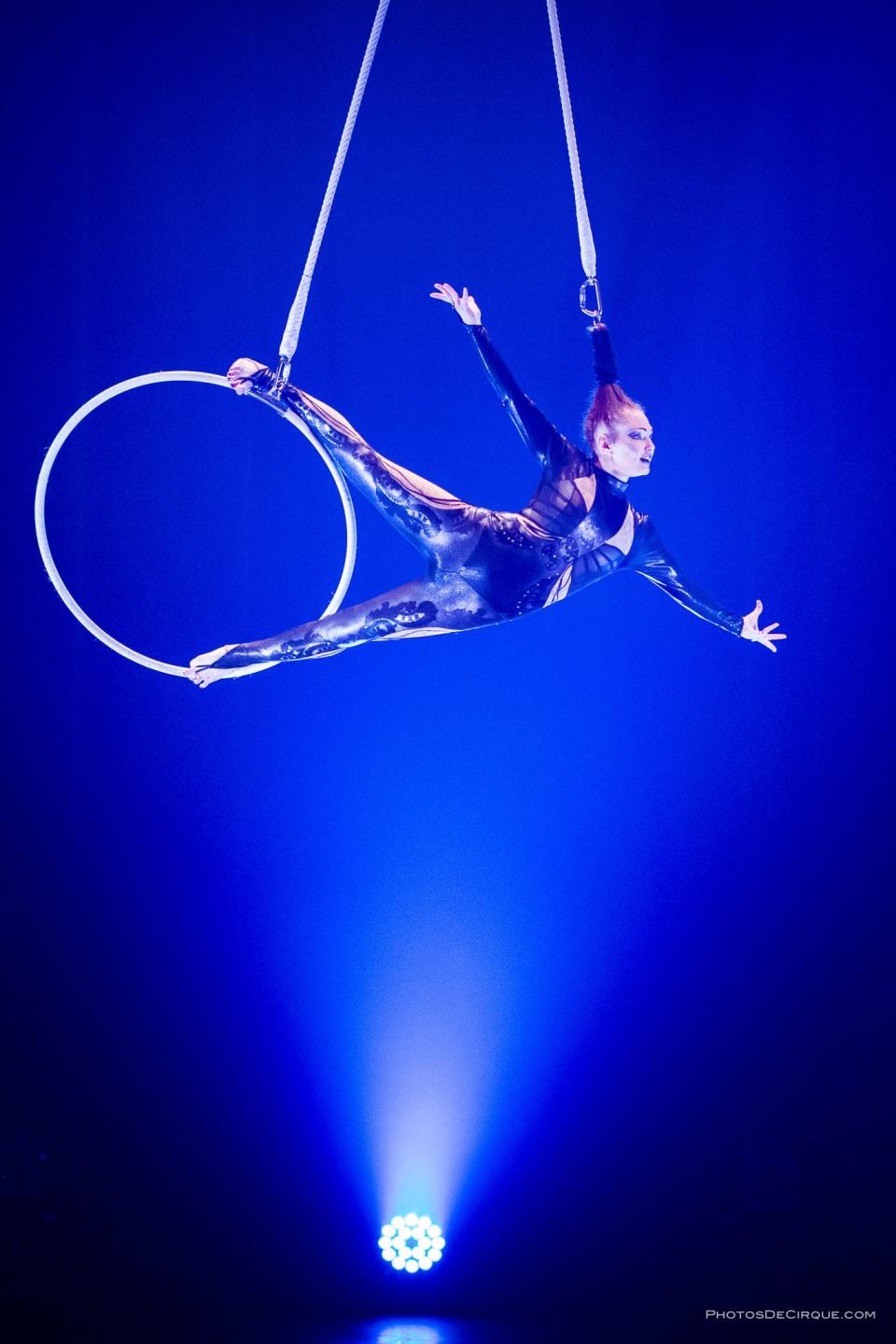 Samantha Pitard performs a circus act hanging by her hair during the 2023 edition of Cirque des Voix.