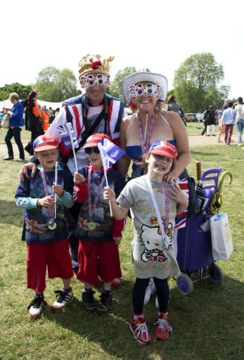 Families enjoy the Jubilee Family Festival in central London as Britain celebrates the Queen's diamond jubilee. Britain is celebrating the diamond jubilee of Queen Elizabeth II, marking 60 years on the throne during which she has set a number of landmarks