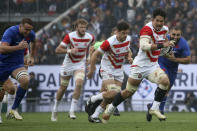 FILE - Japan's Kazuki Himeno runs with the ball during the rugby union international between France and Japan in Toulouse, France, on Nov. 20, 2022. Japan has been a fan favorite at the last two Rugby World Cups for its underdog victories over top-tier teams. Its win over the Springboks in 2015 has passed into lore as the Miracle of Brighton and its victories over Scotland and Ireland in 2019 caused jubilation in a World Cup hosted by Japan. (AP Photo/Bob Edme, File)