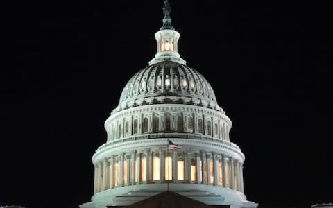 Senators face a long night as they wait to vote on a new spending bill - Credit: Getty Images