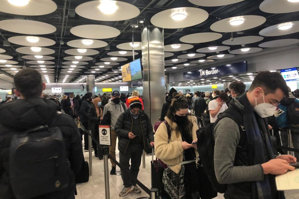 <p>People queue at terminal 5 of Heathrow Airport on Friday</p> (PIA JOSEPHSON via REUTERS)