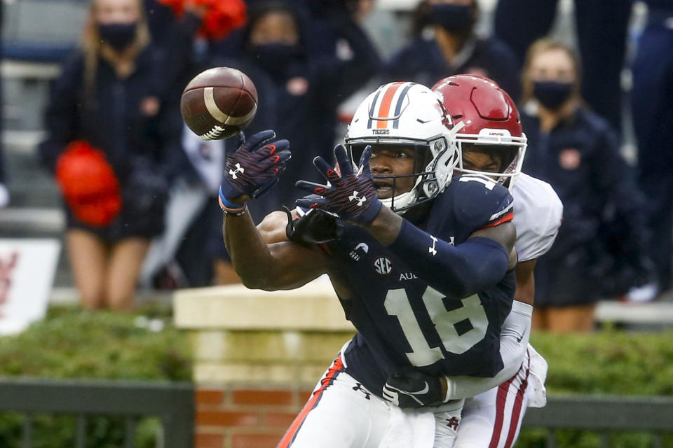 Auburn wide receiver Seth Williams (18) had a rough day catching the football against Arkansas. (AP Photo/Butch Dill)