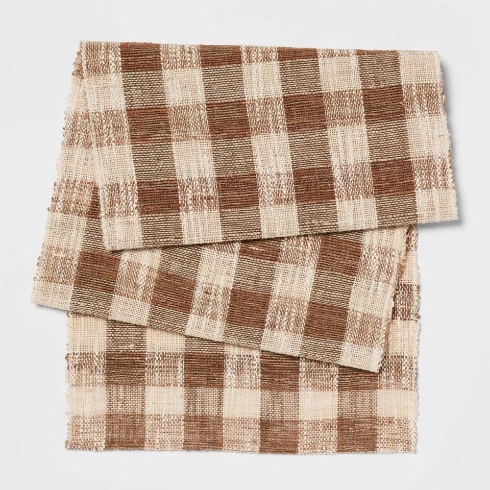 <p><a href="https://go.redirectingat.com?id=74968X1596630&url=https%3A%2F%2Fwww.target.com%2Fp%2Fcotton-gingham-table-runner-brown-threshold%2F-%2FA-85032770&sref=https%3A%2F%2Fwww.countryliving.com%2Fshopping%2Fg46229949%2Fbest-table-runners%2F" rel="nofollow noopener" target="_blank" data-ylk="slk:Shop Now;elm:context_link;itc:0;sec:content-canvas" class="link ">Shop Now</a></p><p>Cotton Gingham Table Runner Brown</p><p>target.com</p><p>$18.00</p>