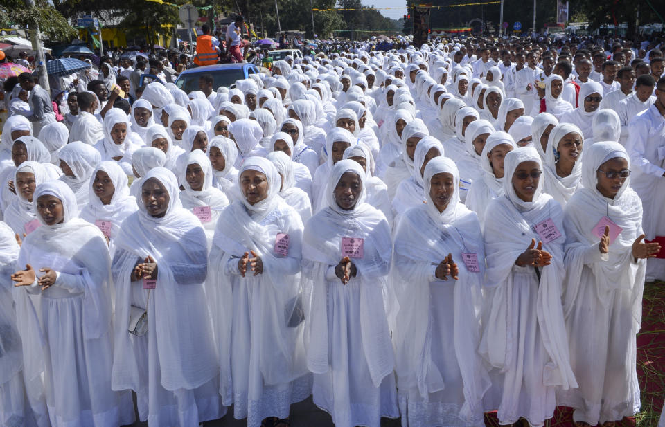 Christians from the Ethiopian Orthodox church celebrate the first day of the festival of Timkat, or Epiphany, in the capital Addis Ababa, Ethiopia Sunday, Jan. 19, 2020. The annual festival celebrates the baptism of Jesus Christ in the River Jordan. (AP Photo)