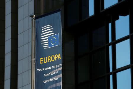 A flag is seen outside the European Council headquarters on the eve of a EU Summit in Brussels, Belgium December 14, 2016. REUTERS/Yves Herman