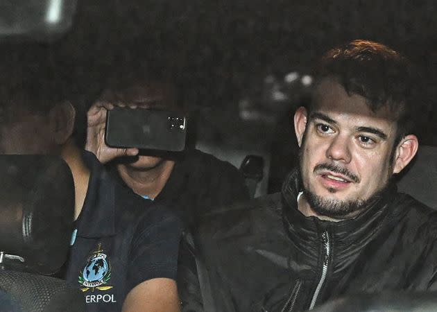 Joran van der Sloot is transferred in a police car in Lima on June 8, 2023.