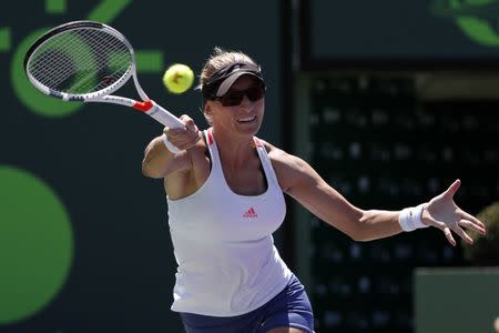 Mar 28, 2017; Miami, FL, USA; Mirjana Lucic-Baroni of Croatia hits a forehand against Karoilina Pliskova of the Czech Republic (not pictured) on day eight of the 2017 Miami Open at Crandon Park Tennis Center. Mandatory Credit: Geoff Burke-USA TODAY Sports
