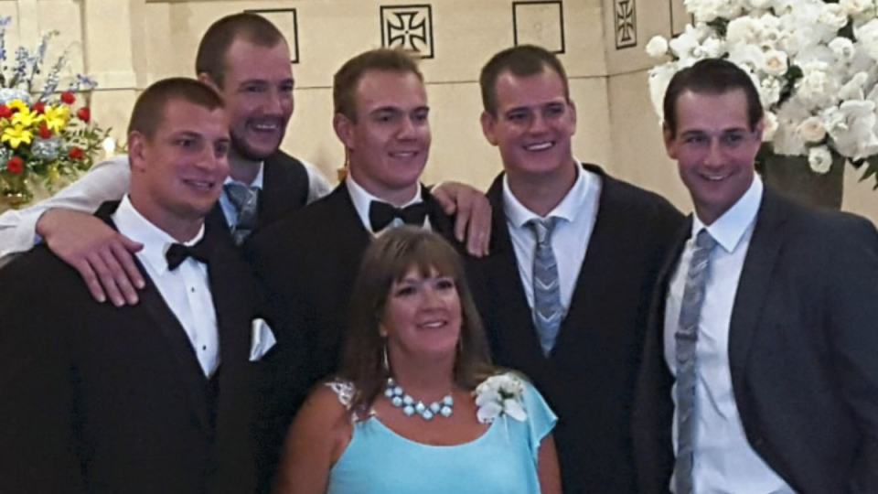 <span><span>Diane (center), with her sons, Rob, Gordie, Chris, Glenn, and Dan</span><span>courtesy of Diane Gronkowski</span></span>