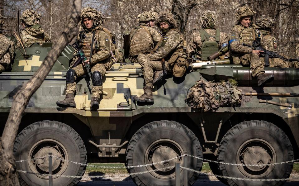 Ukrainian soldiers sit on a armoured military vehicule in the city of Severodonetsk, Donbas region, on April 7, 2022 - FADEL SENNA 