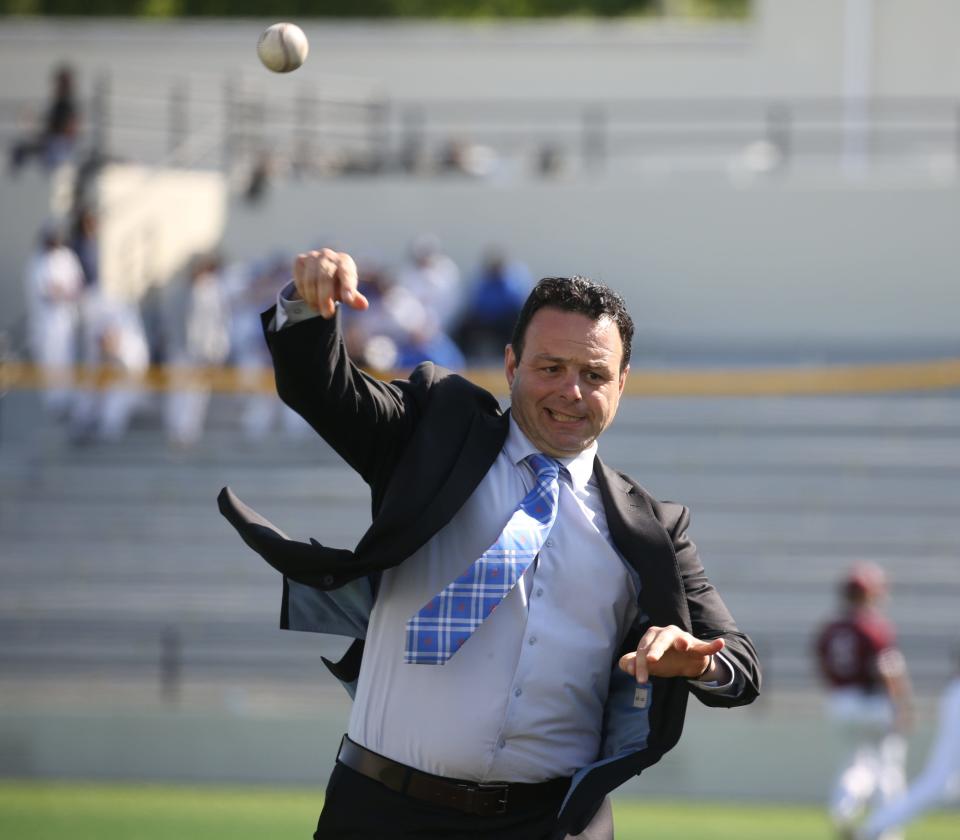 Paterson, NJ - May 17, 2023 — Mayor Andre Sayegh throws out the ceremonial first pitch before the Eastside HS baseball team plays its first game in 26 years at the rebuilt Hinchliffe Stadium.