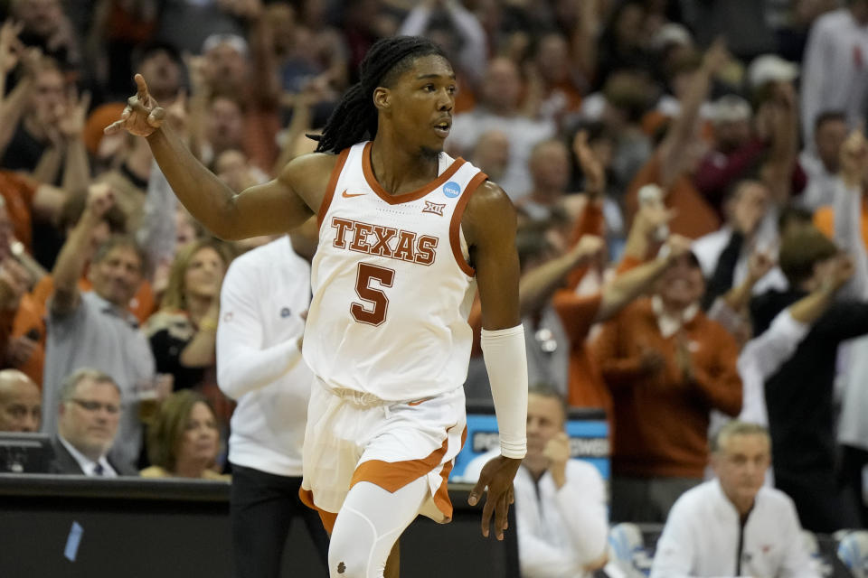 Texas guard Marcus Carr celebrates after scoring against Xavier in the second half of a Sweet 16 college basketball game in the Midwest Regional of the NCAA Tournament Friday, March 24, 2023, in Kansas City, Mo. (AP Photo/Jeff Roberson)