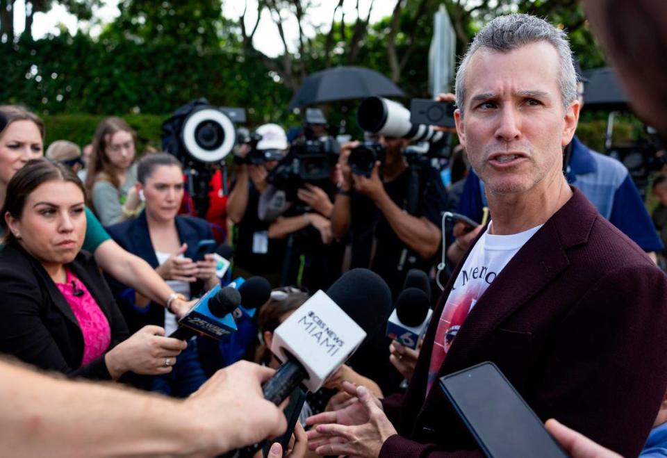 Max Schachter speaks to members of the media as crews use heavy equipment to tear down the 1200 building of Marjory Stoneman Douglas High School on Friday, June 14, 2024, in Parkland, Fla. Schachter’s 14-year-old son, Alex, was among the 17 people who died in the February 14, 2018, mass shooting at the school.