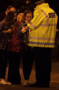 <p>A police officer talks to locals outside the Manchester Arena, where U.S. singer Ariana Grande had been performing, in Manchester, northern England, Britain May 22, 2017. (Jon Super/Reuters) </p>