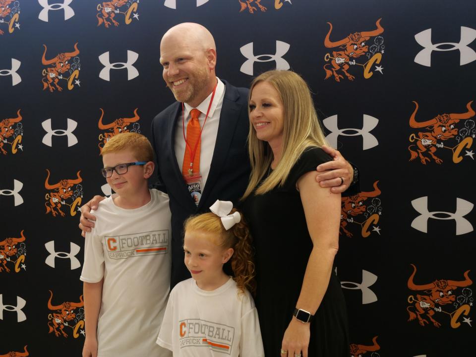 New Caprock head football coach Rowdy Freeman poses with his family on Tuesday, May 23, 2023 at Caprock High School.