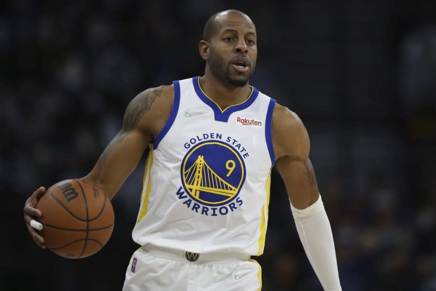 Golden State Warriors forward Andre Iguodala handles the ball during the second half of an NBA basketball game against the Minnesota Timberwolves, Jan. 16, 2022, in Minneapolis. (AP Photo/Stacy Bengs, File)