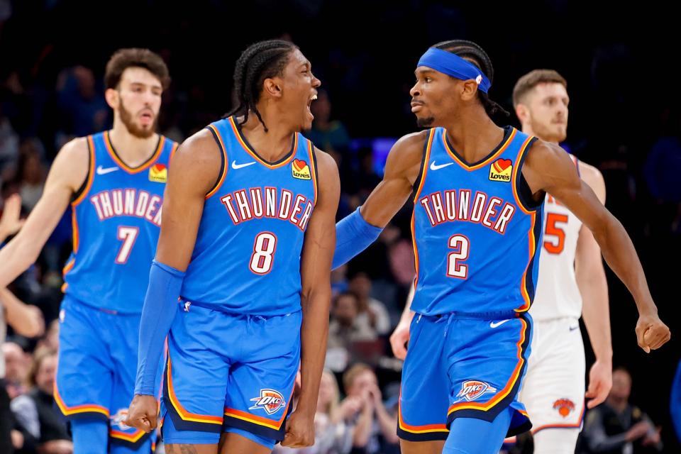 Oklahoma City forward Jalen Williams (8) celebrates a 3-point play with Oklahoma City guard Shai Gilgeous-Alexander (2) in the fourth quarter during an NBA game between the Oklahoma City Thunder and the New York Knicks at the Paycom Center in Oklahoma City, on Wednesday, Dec. 27, 2023.