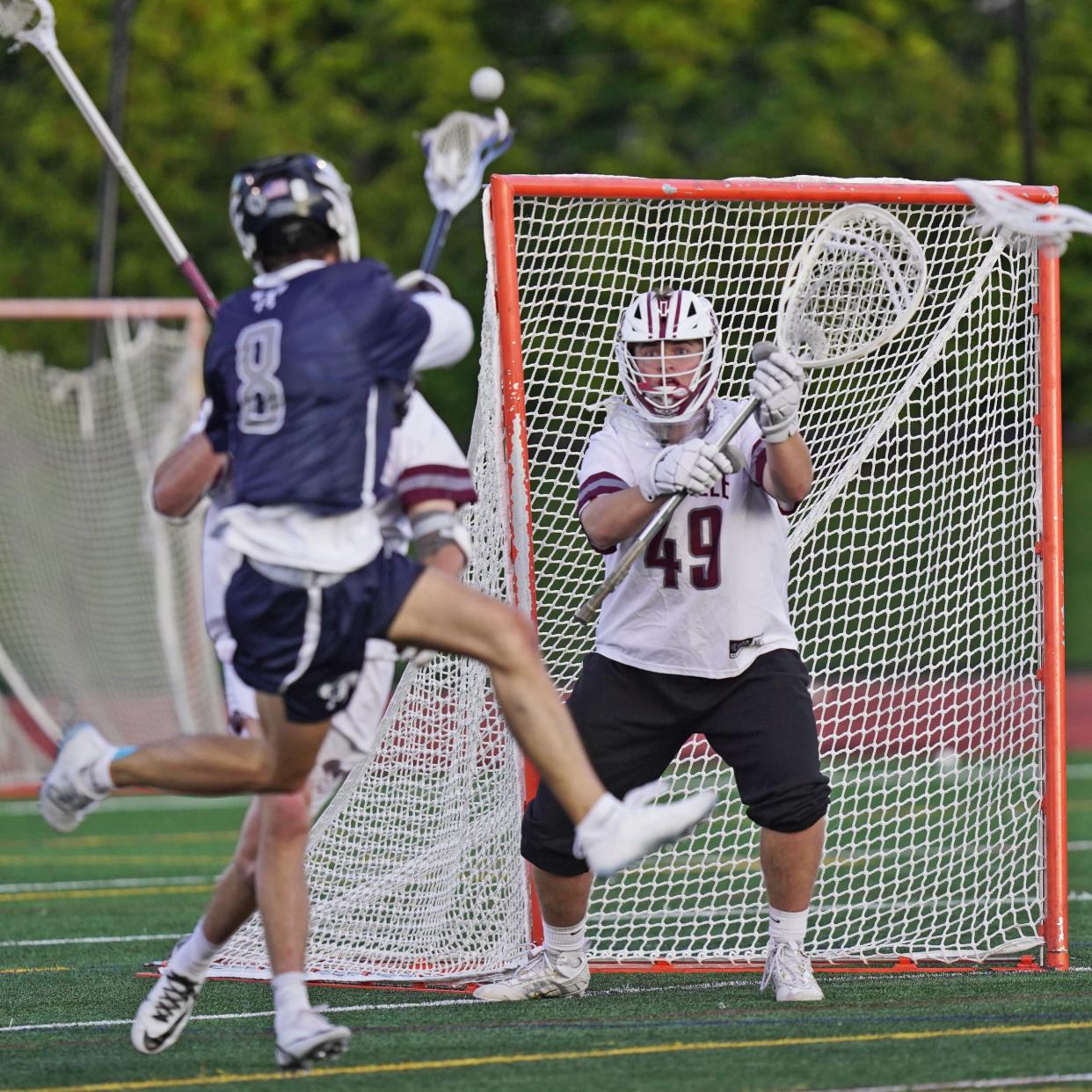 La Salle goalie Connor Kelley keeps a careful eye on the shot of Moses Brown's Chase Wightman during the second quarter. Kelley made the save and helped the Rams pitch a shutout in the quarter on their way to a 22-5 win.