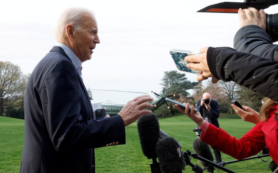 Joe Biden answers questions from reporters outside the White House - REUTERS/Jonathan Ernst