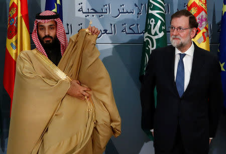 Saudi Arabia's Crown Prince Mohammed bin Salman stands with Spain's Prime Minister Mariano Rajoy during a signing ceremony at the Moncloa Palace in Madrid, Spain, April 12, 2018. REUTERS/Juan Medina