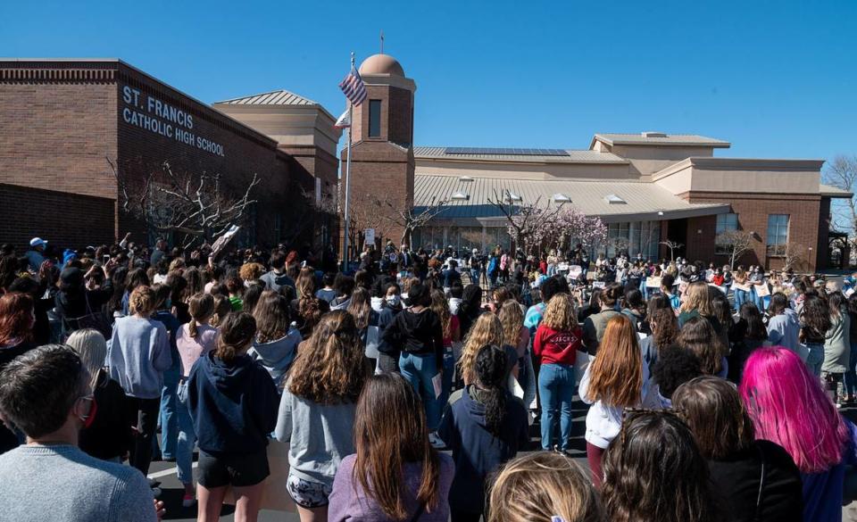 St. Francis High School students show support for Black students during a United for Change rally Wednesday, Feb. 24, 2021, in Sacramento, after a student was disciplined for allegedly using a Snapchat feature to imitate Blackface and mock a Black peer.