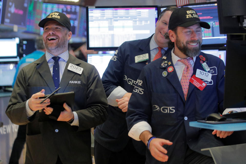 Traders work on the floor at the New York Stock Exchange (NYSE) in New York, U.S., January 10, 2020. REUTERS/Brendan McDermid