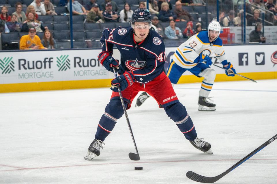 Oct 4, 2023; Columbus, Ohio, United States;
Columbus Blue Jackets right wing Emil Bemstrom (52) races for possession of the puck during their game against the Buffalo Sabres on Wednesday, Oct. 4, 2023 at Nationwide Arena.