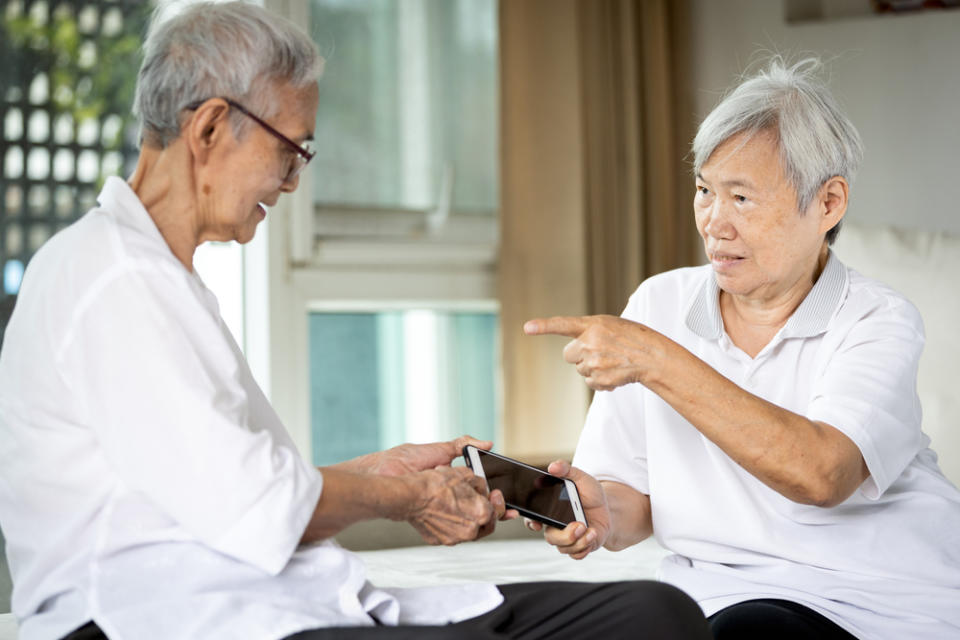 Two old women arguing