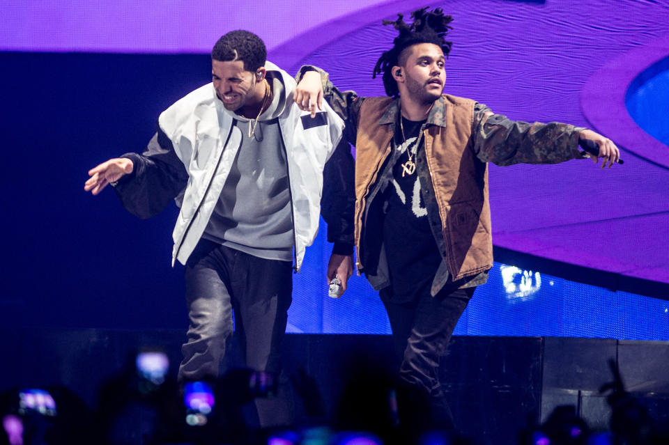 Drake and The Weeknd perform onstage during Drake's "Nothing Was the Same" world tour on March 16, 2014. (Photo: Ollie Millington via Getty Images)