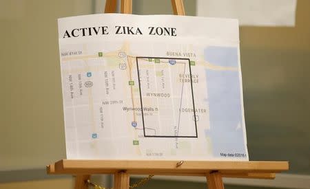 A map showing the active Zika zone is on display at the Borinquen Health Care Center in Miami, Florida, U.S. on August 9, 2016. REUTERS/Chris Keane/Files