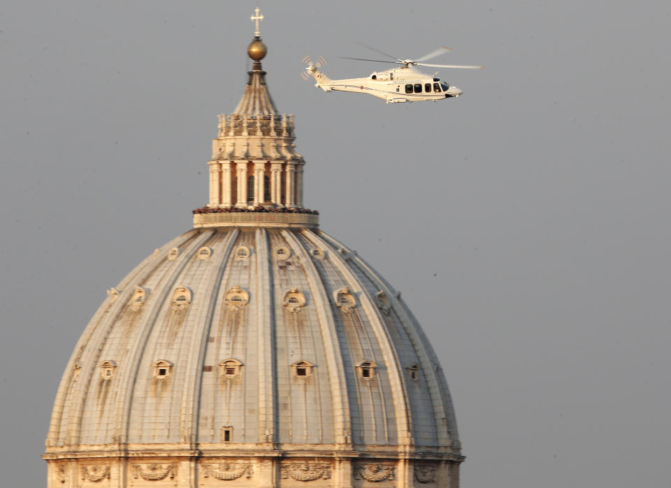 FILE - A helicopter with Pope Benedict XVI onboard leaves the Vatican, on Feb. 28, 2013. Pope Benedict XVI’s 2013 resignation sparked calls for rules and regulations for future retired popes to avoid the kind of confusion that ensued. Benedict, the German theologian who will be remembered as the first pope in 600 years to resign, has died, the Vatican announced Saturday Dec. 31, 2022. He was 95. (AP Photo/Michael Sohn, File)