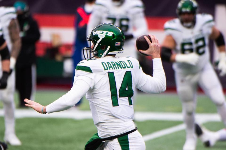 Sam Darnold #14 of the New York Jets makes a pass against the New England Patriots in the first half at Gillette Stadium on January 3, 2021, in Foxborough, Mass. (Kathryn Riley/Getty Images/TNS)