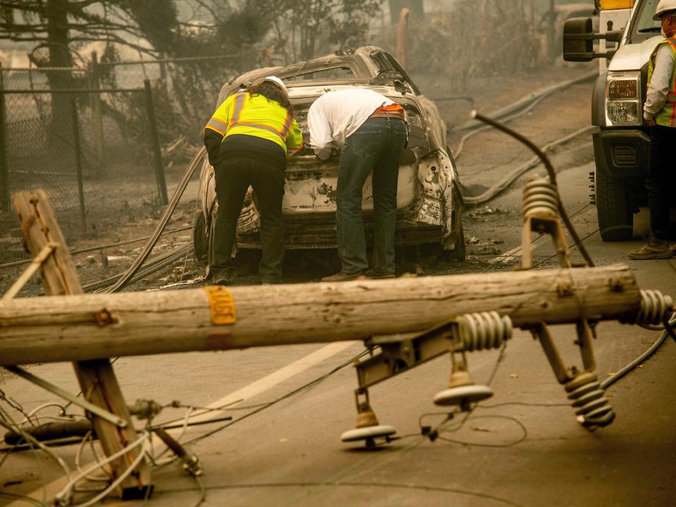 utility pole power pole broken camp fire