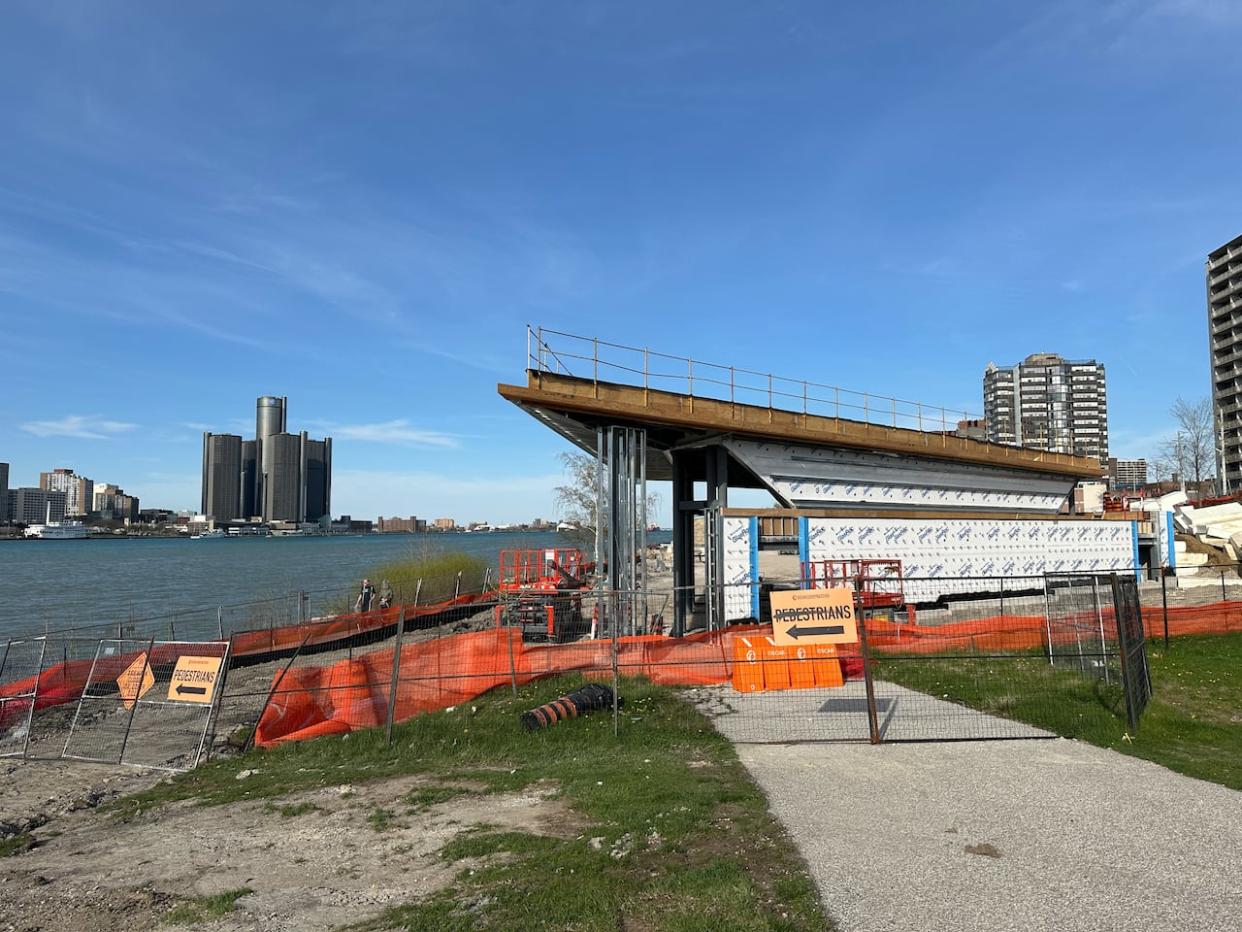 The showcase building of the Legacy Beacon project on Windsor's riverfront, meant to house the restored Streetcar No. 351. Under construction in April 2024. (Dalson Chen/CBC - image credit)