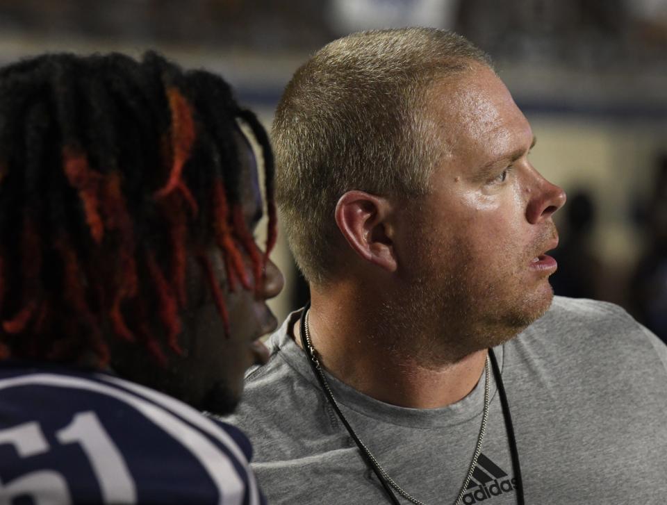 Huntington head football coach Stephen Dennis at a scrimmage game against Airline.