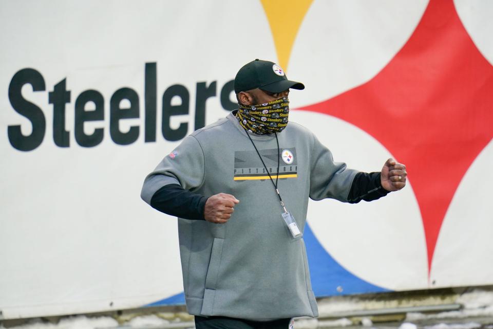 Pittsburgh Steelers head coach Mike Tomlin celebrates after an NFL football game against the Indianapolis Colts, Sunday, Dec. 27, 2020, in Pittsburgh. (AP Photo/Gene J. Puskar)