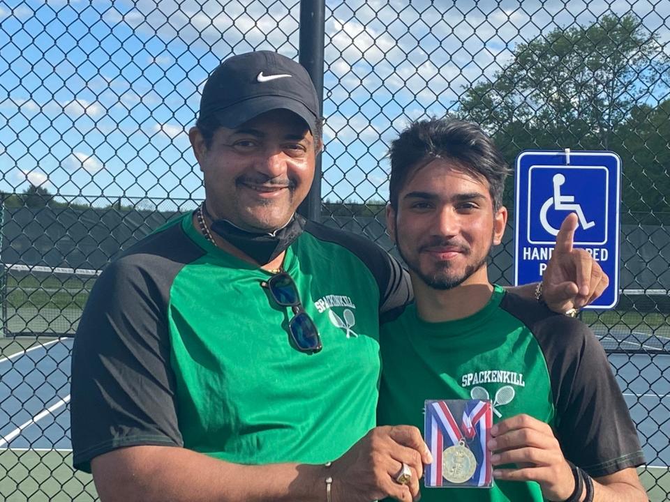 Spackenkill's Jeet Shanani, right, poses with his medal after winning the singles championship in the Mid-Hudson Athletic League boys tennis championship on May 17, 2022.