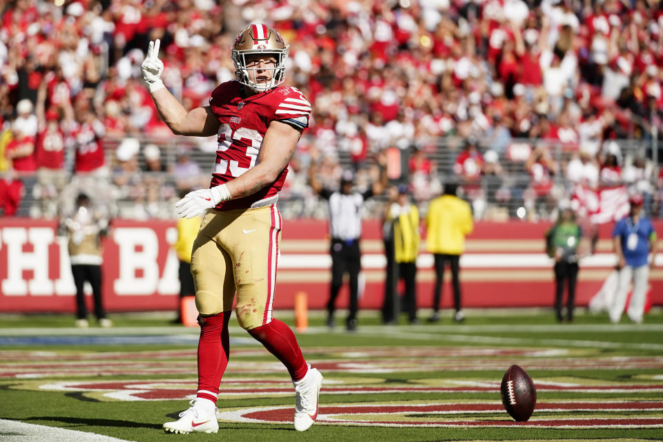 San Francisco 49ers running back Christian McCaffrey (23) celebrates after scoring against the Arizona Cardinals during the second half of an NFL football game in Santa Clara, Calif., Sunday, Oct. 1, 2023. (AP Photo/Godofredo A. Vásquez)