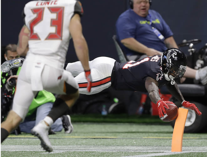 Hitting the pylon was a very rare sight for Julio Jones owners last year. How many TDs should investors expect this time around? (AP Photo/Chris O’Meara)