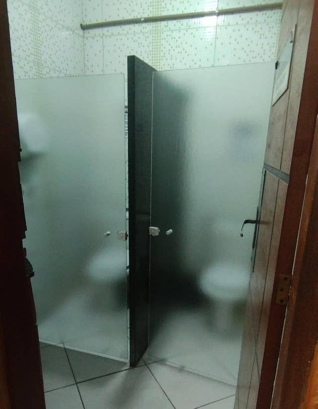 the stall doors are transparent