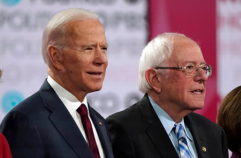 Democratic presidential candidates former Vice President Joe Biden and Senator Bernie Sanders Democratic stand together before the 2020 campaign debate at Loyola Marymount University in Los Angeles