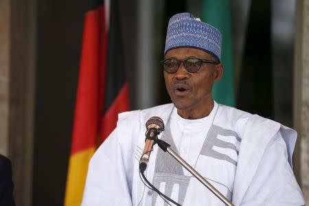 FILE PHOTO - Nigerian President Muhammadu Buhari speaks during German President Joachim Gauck's visit to the State House in Abuja, Nigeria February 11, 2016. REUTERS/Afolabi Sotunde/File Photo