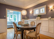 <body> <p>No matter the menu, your dining experience will be less than its best if your lighting doesn’t set the right mood. For better light, first consider your fixtures. A pendant light positioned over the <a rel="nofollow noopener" href=" http://www.bobvila.com/slideshow/13-seriously-doable-ways-to-diy-a-kitchen-table-49339?bv=yahoo" target="_blank" data-ylk="slk:dining table;elm:context_link;itc:0;sec:content-canvas" class="link ">dining table</a> is a good bet. Measure 30 inches from the tabletop; that's where you'll want the bottom of your pendant light to hang. Next, take care to choose the right bulb. For a cozy, intimate setting choose soft white light rather than cool or bright white bulbs. Also, consider adding a dimmer switch so instant ambiance is only a click away. </p> <p><strong>Related: <a rel="nofollow noopener" href=" http://www.bobvila.com/slideshow/11-big-ideas-for-a-small-dining-room-49506#.V72eaZMrKRs?bv=yahoo" target="_blank" data-ylk="slk:11 Big Ideas for a Small Dining Room;elm:context_link;itc:0;sec:content-canvas" class="link ">11 Big Ideas for a Small Dining Room</a> </strong> </p> </body>