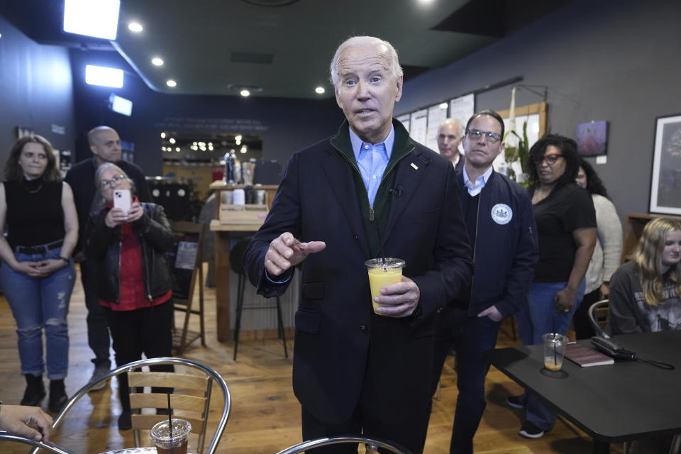 FILE - President Joe Biden talks about his economic agenda, during a visit to the Nowhere Coffee shop, Jan. 12, 2024, in Emmaus, Pa. Biden is going small to try to win big in November. With 10 months to go until Election Day, the Democratic incumbent is all in on minimalist events — visits to a boba tea store, a family's kitchen and a barbershop, for example — rather than big rallies. (AP Photo/Evan Vucci, File)