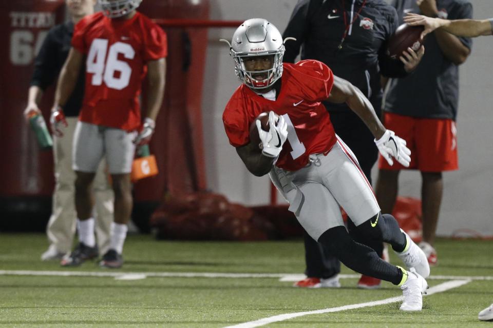 Ohio State wide receiver Johnnie Dixon runs the ball during spring NCAA college football practice Tuesday, March 7, 2017, in Columbus, Ohio. (AP Photo/Jay LaPrete)