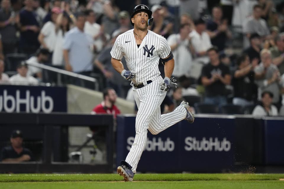 New York Yankees' Giancarlo Stanton runs the bases after hitting a home run against the Minnesota Twins during the sixth inning of a baseball game Friday, April 14, 2023, in New York. (AP Photo/Frank Franklin II)