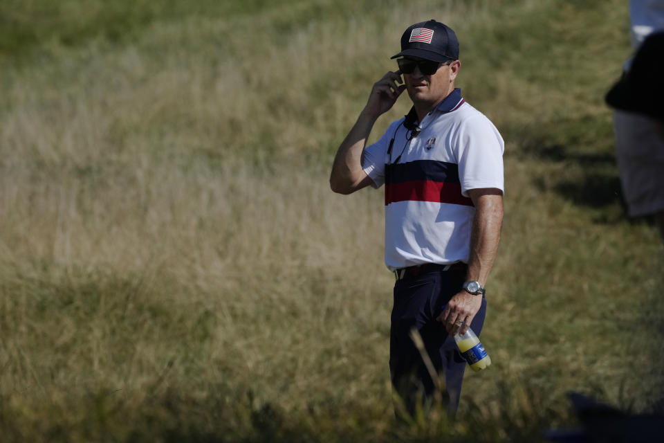 United States' Team Captain Zach Johnson watches his players from the 4th fairway during their afternoon Fourballs matches at the Ryder Cup golf tournament at the Marco Simone Golf Club in Guidonia Montecelio, Italy, Saturday, Sept. 30, 2023. (AP Photo/Andrew Medichini)